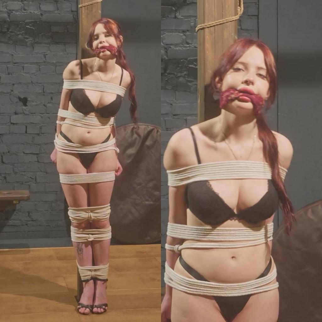 Esta - A Gentle Struggling Bondage Doll Tied to the Pole - Part 2 在这段视频中，迷人的艾斯塔被紧紧地绑在一根柱子上，像一个美丽而无助的玩偶一样站在那里，轻轻地试探着缠绕在身上的绳索。<br><br>艾斯塔拥有丰满的嘴唇、精致的娃娃般的五官、纤细的身材和修长的双腿，在这简单的捆绑场景中显得格外引人注目。她穿着露趾高跟鞋，既增添了一丝优雅，又让她的双脚部分裸露在外。<br><br>捆绑对艾斯塔来说仍然是新鲜而陌生的体验，因此整个场景充满了自然的好奇和探索感。她并没有激烈地挣扎——相反，她缓慢地移动身体，轻轻地拉扯着束缚，探索着被捆绑的感觉。<br><br>镜头从不同的角度捕捉着她，聚焦于她的脸庞、修长的双腿、高跟鞋以及她被束缚的身体的柔和动作。<br><br>这是一段简洁而唯美的捆绑视频，围绕着艾斯塔娃娃般的美丽、轻柔的挣扎以及她迈向全新体验的第一步而展开。In this clip, charming Esta is tied tightly to a pole, standing there like a beautiful helpless doll while gently testing the ropes around her.<br><br><br>With her plump lips, delicate doll-like features, slim figure, and long legs, Esta looks especially striking in this simple bondage setup. She wears high heels with open toes, adding an elegant touch while leaving her feet partially exposed.<br><br><br>Bondage is still something new and unusual for Esta, so the whole scene has a very natural feeling of curiosity and discovery. She does not fight the ropes aggressively - instead, she slowly shifts her body, gently pulls against the restraints, and explores the sensation of being tied in place.<br><br><br>The camera takes its time capturing her from different angles, focusing on her face, long legs, heels, and the soft movements of her restrained body.<br><br><br>A simple, aesthetic bondage clip built around Esta's doll-like beauty, gentle struggling, and first steps into a new experience.
