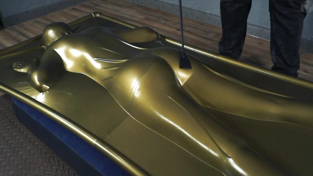 Ass flogging in a latex gold vacuum bed Sonya is delinquent, and Mr. Bob decides to punish the girl. He chose a golden vacuum bed to punish her. The air was pumped out of the golden vacuum bed, and the spanking began. Loud spanks ran out, her butt and thighs burned.