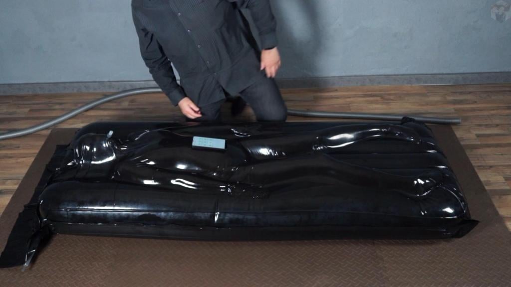 A girl on an inflatable mattress inside a vacuum plastic case with a vibrator You'll remember by now that Sonya likes comfort. One day she needs a soft camping bag, and now she needs an air mattress. Mr. Bob fulfills any girl's dreams.