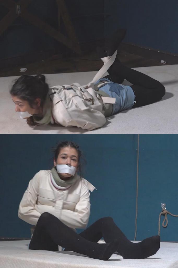6004 Veronika in Straitjacket Timeout 维罗妮卡需要冷静一下。穿上束缚衣冷静一下。我们用最小号的束缚衣，把她紧紧地绑了起来。她穿着紧身裤和毛衣，挣扎的时候很快就觉得热了。所以我们又加了一根带子，把她像猪一样绑起来，让她不再挣扎。Veronika needs a timeout. A straitjacket time out. Using the smallest jacket we have, she is strapped in tight into the jacket. Wearing tights and a sweater, it soon gets warm when shes struggling. So we stop her from struggling with an extra strap to hogstrait her.