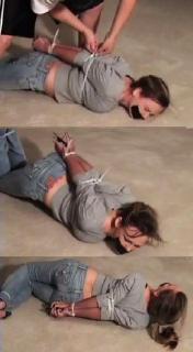 Dallas - Purple Arms From Brutal Zipties, Busty Little Coed Desperately Tries To Escape Sexy coed Dallas has been thrown to the ground in her tight ass jeans, her arms pinned to her back with brutally tight zipties painfully crushing her elbows together. <br><br>Her captor lashes another ziptie around the buxom girl's chest, pulling it mercilessly tight to the utter maximum, pinning her elbows even tighter against her back. He throws some scissors beside her, but the poor pretty package is unable to handle them with her numb fingers and her useless arms, dark purple from the elbow-crushing zipties cutting deep into her flesh. 