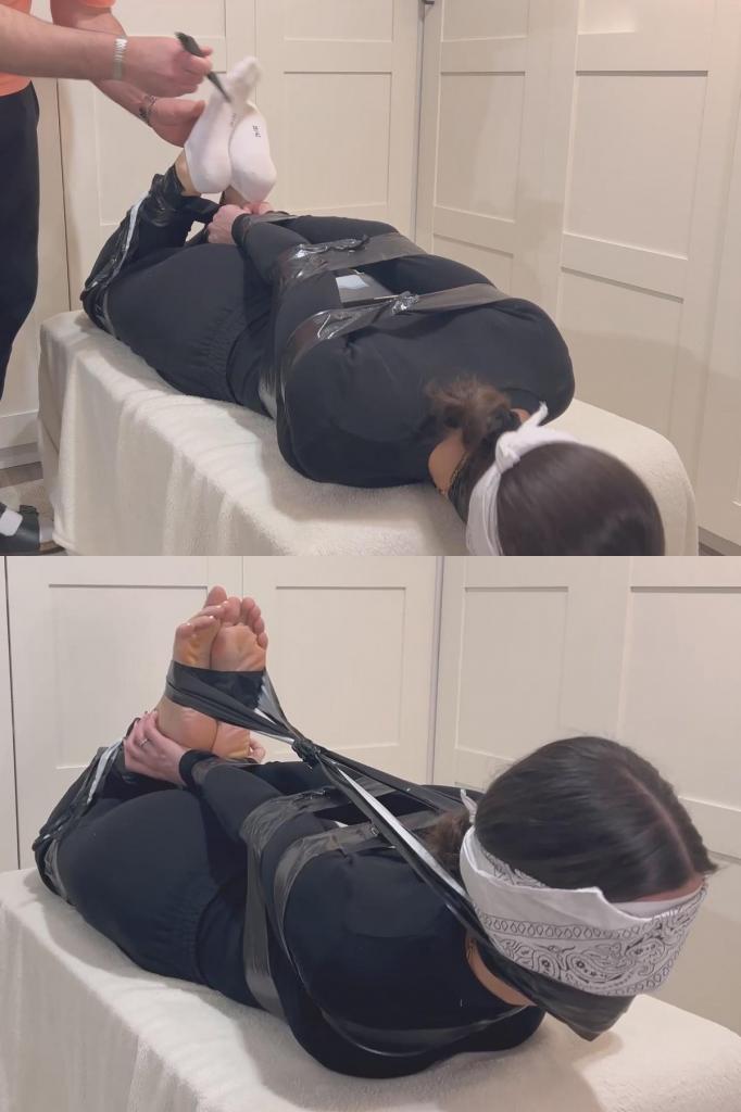Nice and tight tape hogtie 今天，我被黑色胶带紧紧捆绑起来。我的嘴也被袜子和胶带堵住了。最后，我的头和脚也被绑在了一起。Today, I am tightly bound with black tape. I am gagged with a sock and tape as well. Finally, my head is tied to my feet.