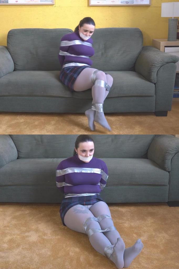6057 Zara in Taped Up in Tights 扎拉不应该在家。但她在这里。那么，在我们搜查这个地方之前我们该做什么呢？把她绑起来。在紧身衣高领上衣、裙子和紧身衣中，我们使用大量胶带来确保她的安全。Zara shouldnt be at home. But here she is. So what do we do before we ransack the place? Tape her up. In a tights turtleneck top, skirt and tights, we use lots of tape to keep her secure.