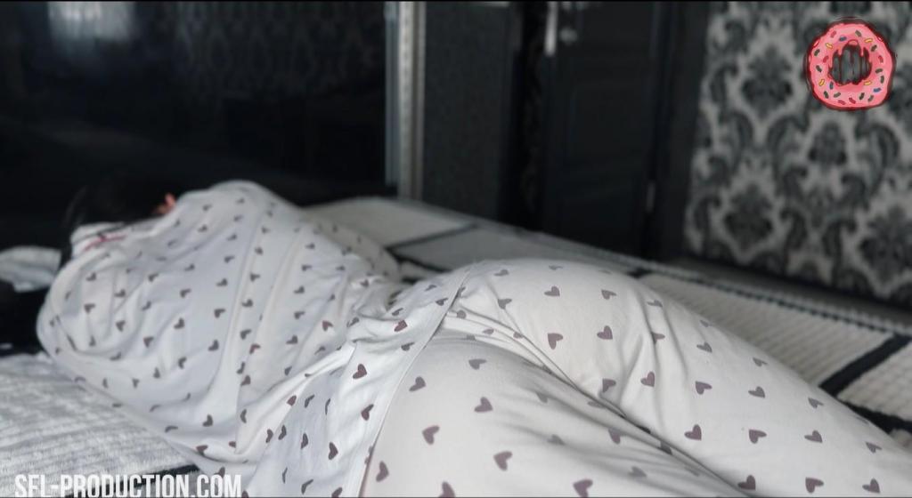 Anonymous (Part 2) the heroine its attacked and defeated while she is in her bethroom, and she wear pijamas