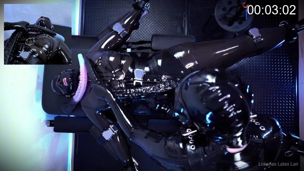 Day of the slippery thing Strapped down on my Hellcat bench, wrapped tight in shining latex, every movement sends electricity through my body. The electro pads keep me trembling while my gimp slowly takes control of the situation.<br><br>And then he brings out the thing.<br><br>Huge. Smooth. Perfectly shaped to slide deeper and deeper while I’m completely helpless to resist. My body arches against it, latex squeaking as I try to keep up with the overwhelming sensations.<br><br>Every pulse of electricity… every movement… every inch pushing further…<br><br>I can’t move.<br><br>I can’t stop it.<br><br>And honestly… I don’t want to.<br><br>If you want to see how far he takes it you know what to do.