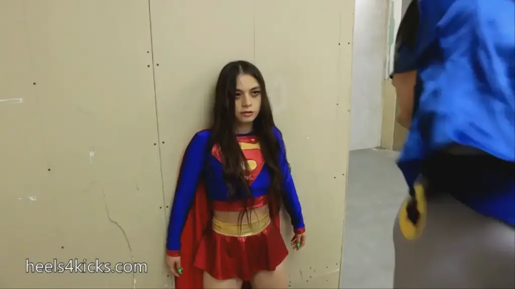 SuperNaomi tries to bring BatRob back to the family BatRob becomes a traitor and our super heroine SuperNaomi comes to punish him for his actions. She tries to convince him to return to the League, but he refuses and attacks her. He punches her several times, but Naomi stands firm, unmoving. When she strikes back, Rob is sent flying like a ragdoll, as she possesses incredible strength and resilience.